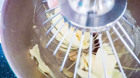 Step by step. Mixing ingredients in kitchen mixer to make  vanilla cupcakes.の写真素材
