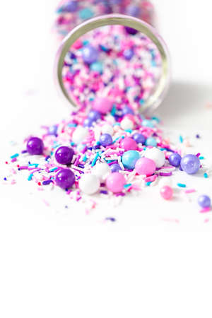 Colorful purple sprinkle blend on a white background.の写真素材