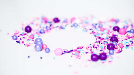 Colorful purple sprinkle blend on a white background.の写真素材