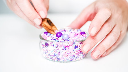 Colorful purple sprinkle blend on a white background.