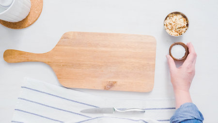Step by step. Preparing kitchen counter for making watermelon with drizzled chocolate.