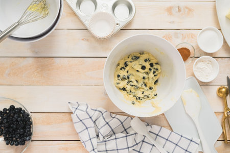 Flat lay. Ingredients on the table to make blueberry muffins.