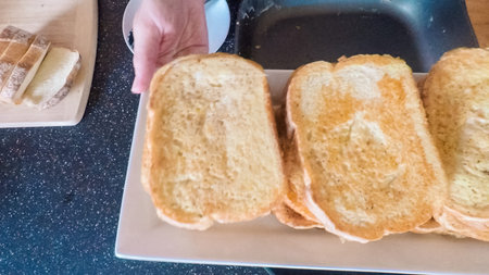 Step by step. Preparing French toast for breakfast.