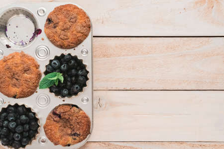 Flat lay. Homemade blueberry muffins made with organic ingredients.の写真素材