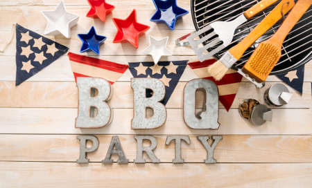 BBQ Time sign with July 4th decorations on a wood boards.の写真素材