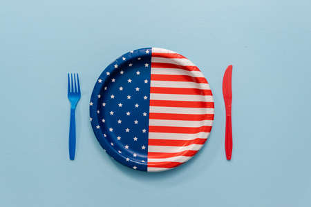 July 4th theme paper plate and plastic utensils.の写真素材