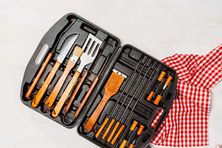 Simple BBQ cooking set in plastic case.の写真素材