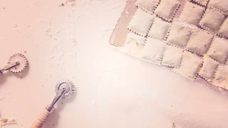 Making Italian raviolis from scratch at the Italian party.の写真素材