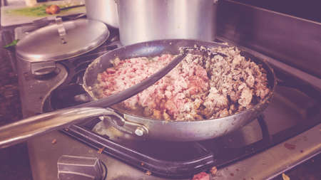 Frying ground beef for Italian raviolis.の写真素材