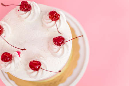 Birthday Spumoni cake on pink background.の写真素材