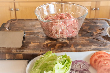 Preparing gourmet burger beef patties for classic burgers.
