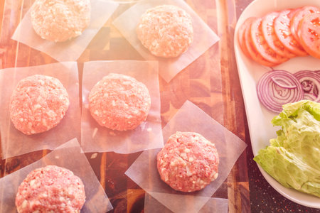 Gourmet burger patties for classic burgers.の写真素材