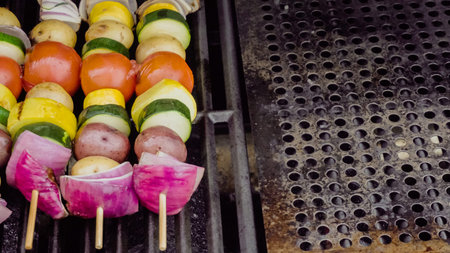 Step by step. Step by step. Grilling veggie skewers and chicken kebabs on outdoor gas grill.
