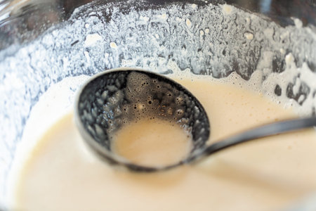Making Russian pancakes from scratch for breakfast.