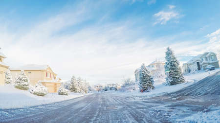 Residential neighborhood after Spring snow storm.の写真素材