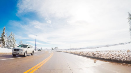 Driving on suburban road after the Sping snow storm.