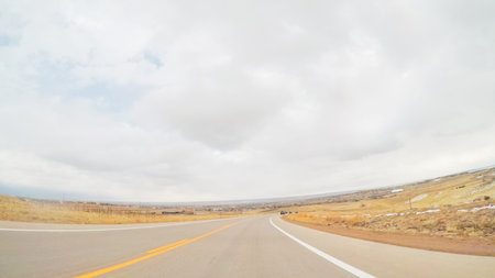 Driving on paved roads in rural suburbia.