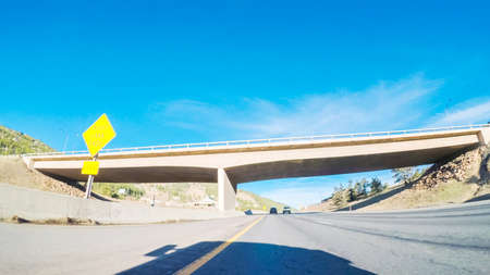 Driving on interstate highway I70 in the mountains.の写真素材