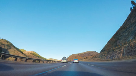 Driving on interstate highway I70 in the mountains.