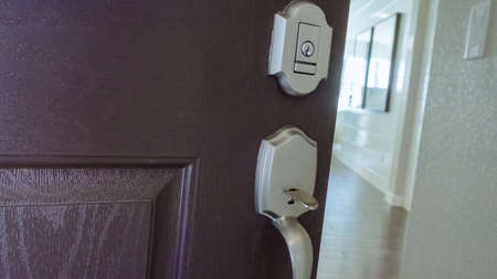 Opening front door of modern residential house.の写真素材