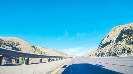 Driving on interstate highway I70 in the mountains.