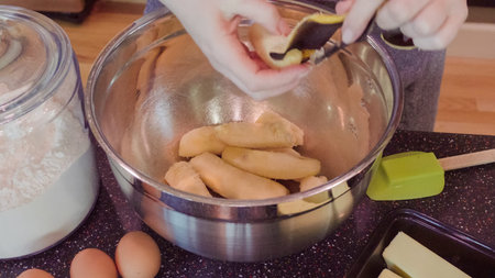 Step by step. Woman baking homemade banana bread.