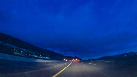Driving on Interstate highway I25 at night.