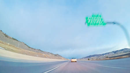 Driving on statehighway 470 at sunrise.の写真素材