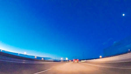 Driving on statehighway 470 at sunrise.の写真素材