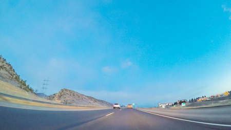Driving on statehighway 470 at sunrise.の写真素材