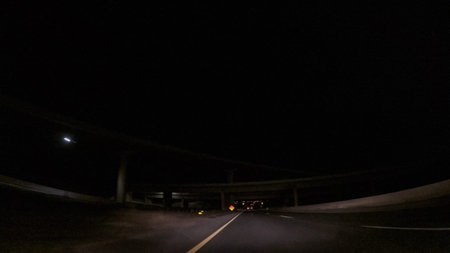 Driving on Interstate highway 470 at night.