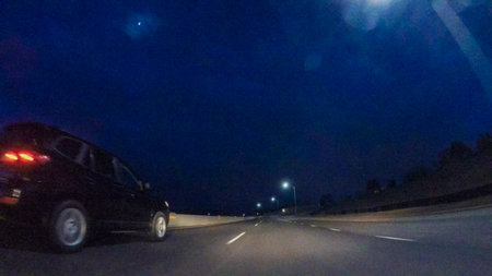 Driving on Interstate highway I25 at night.
