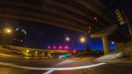 Driving on Interstate highway I25 at night.