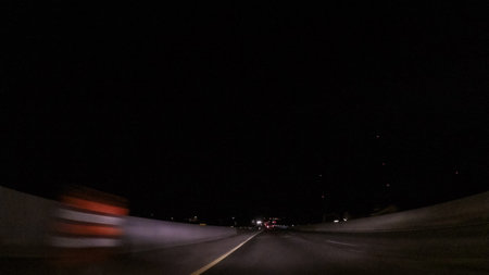 Driving on Interstate highway 470 at night.
