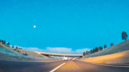 Driving on statehighway 470 at sunrise.の写真素材