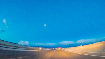 Driving on statehighway 470 at sunrise.の写真素材