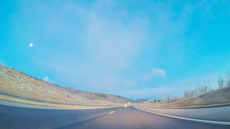Driving on statehighway 470 at sunrise.
