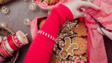 Packaging traditional home made gingerbread cookies as food gifts.