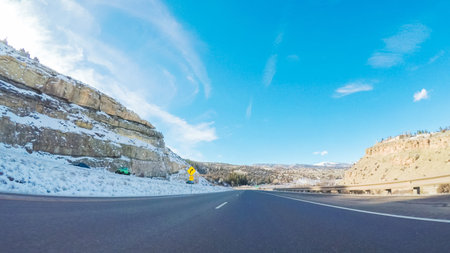 Driving through Mountain terrain in the Winter.
