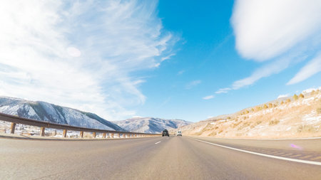 Driving through Mountain terrain in the Winter.