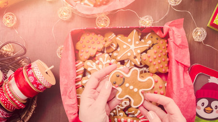 Packaging traditional home made gingerbread cookies as food gifts.