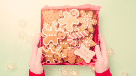 Packaging traditional home made gingerbread cookies as food gifts.