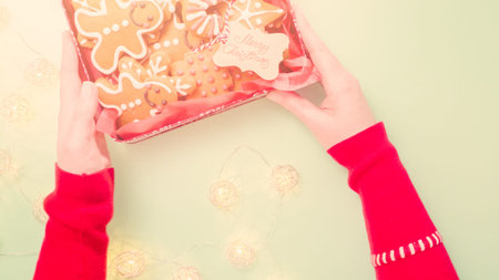 Packaging traditional home made gingerbread cookies as food gifts.