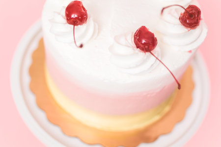 Birthday Spumoni cake on pink background.