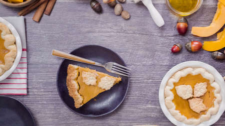 Step by step. Eating slice of freshly baked  pumpkin pie.の写真素材