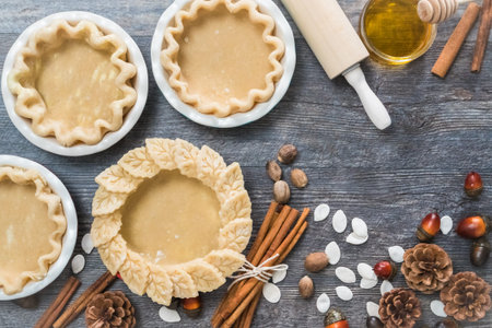 Preparing pie crusts for pumpkin pies.