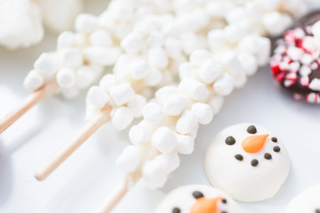 Close up view. Variety of marshmallow toppings with peppermint and chocolate for hot chocolate and...
