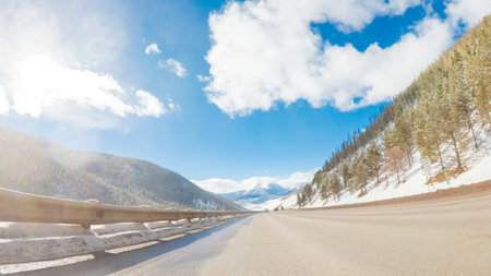 Drivign West on interstate highway I70 through the mountains.