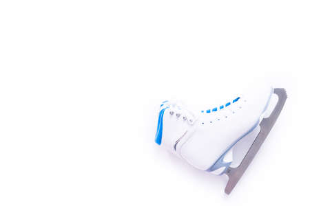 Flat lay. New white figure skates on a white background.の写真素材