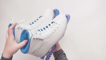 Flat lay. New figure skates on a white background.の写真素材